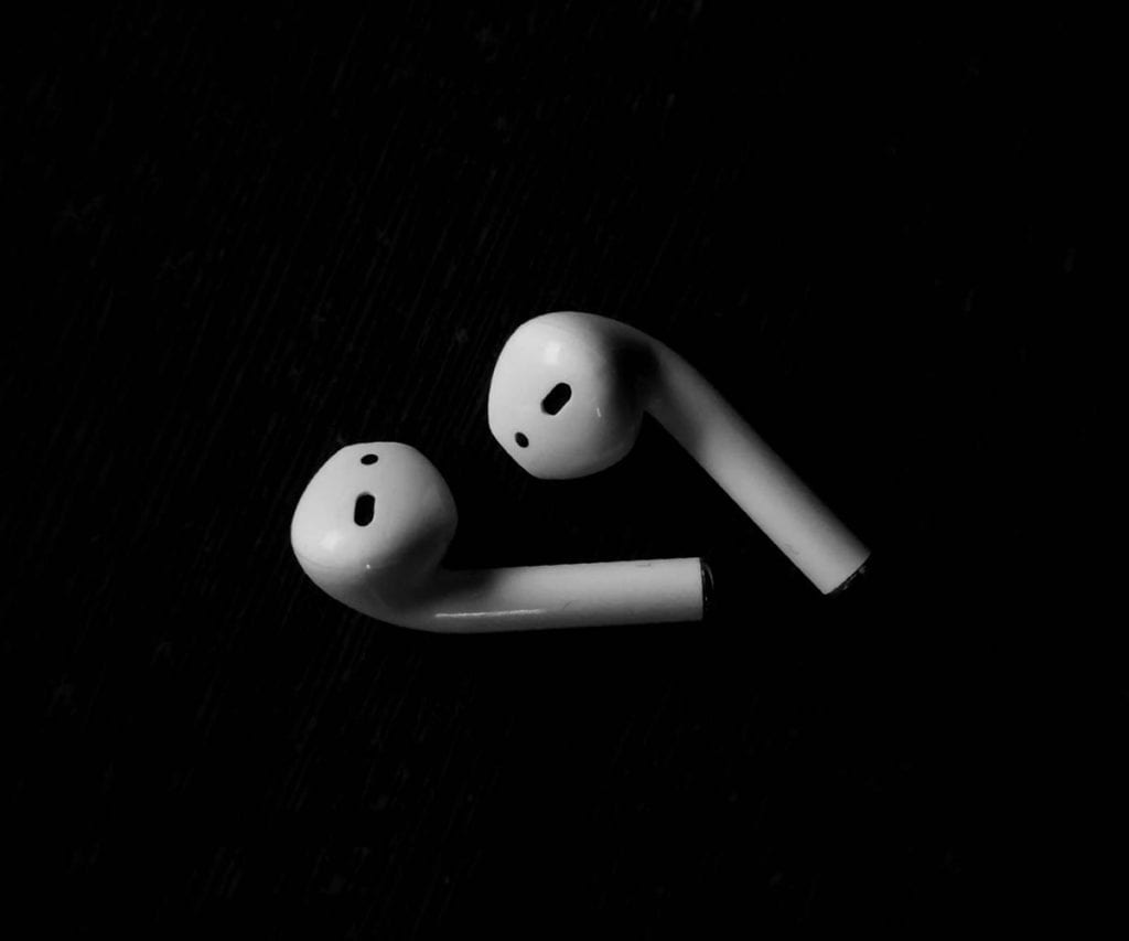 Old Apple AirPods on a table
